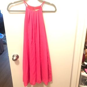 Neon pink dress.